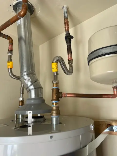 Water heater installation and plumbing repair in Springwells